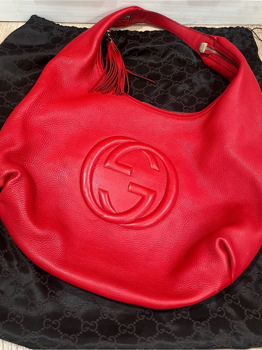 Gucci Red Pebbled Leather Hobo with Tassel Embossed GG